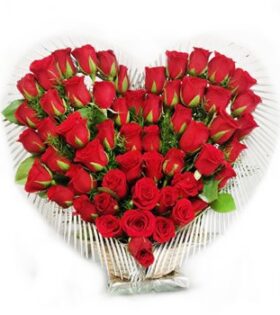 Heart shape arrangement of 100 red roses