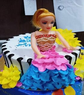 Barbie Sitting On Cake